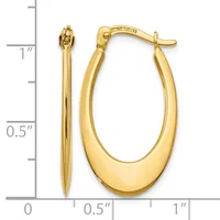 Polished gold-tone oval hoop earrings displayed next to a measurement ruler showing approximately one inch in length.