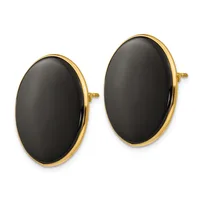 A pair of oval black onyx stud earrings with polished gold bezels and posts, displayed against a white background.