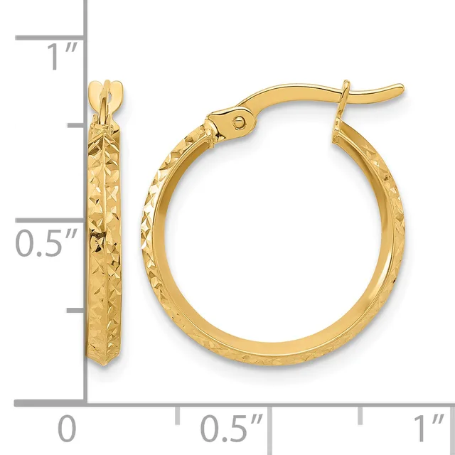 Pair of gold hoop earrings with textured finish and hinged closures, displayed next to a ruler showing approximately one inch in length.