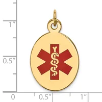 Gold-toned oval medical alert pendant with red enamel Star of Life symbol and gold caduceus, shown next to a ruler indicating approximately one inch in height.