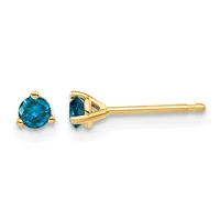 A pair of gold stud earrings with round blue gemstones set in three-prong settings, shown from front and side views.