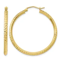A pair of gold hoop earrings with a textured hammered finish, shown from the front and side views.