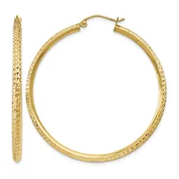 A pair of gold hoop earrings with a textured diamond-cut surface shown from the front and side view.