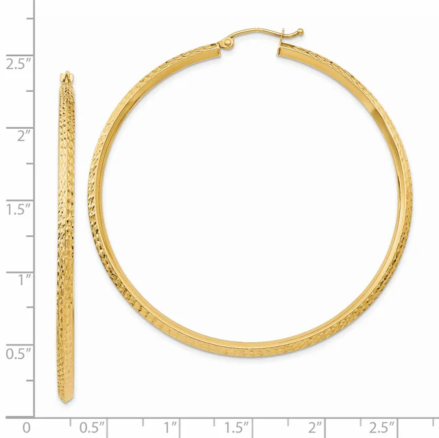 Gold textured hoop earrings with hinged closures, shown from front and side view against a measurement scale.