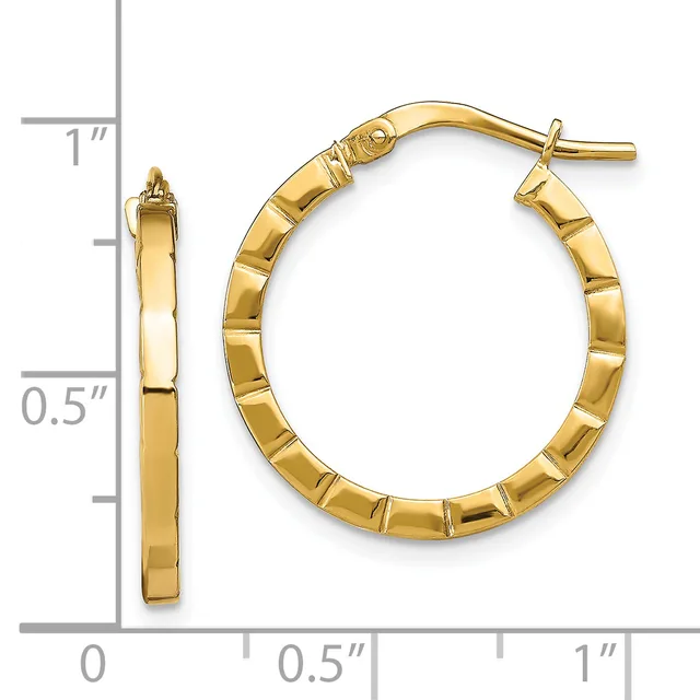Polished gold-tone hoop earrings with textured segmented surface and post backs, shown next to a measurement ruler indicating approximately one inch in diameter.