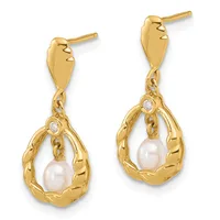 Pair of gold drop earrings with pearl centers surrounded by decorative twisted metal frames and small diamond accents, shown from the front.
