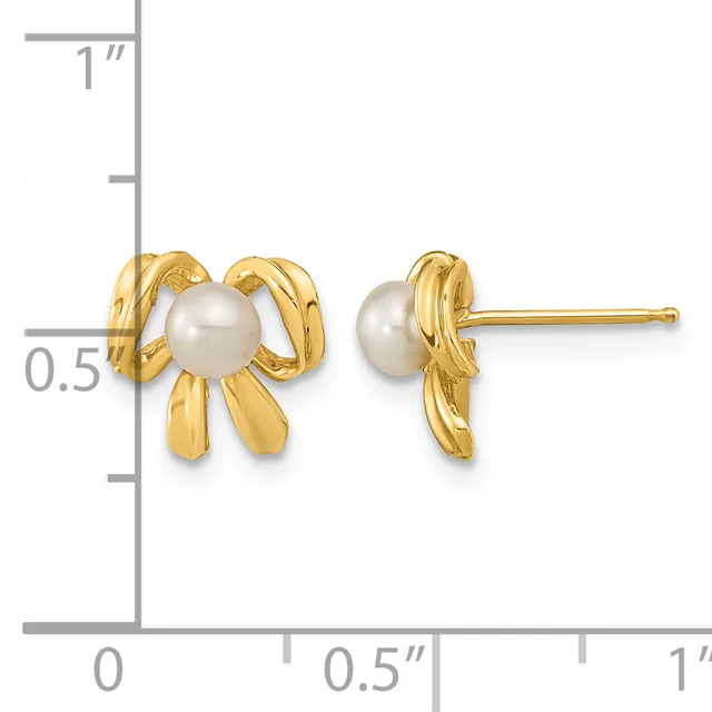 Gold stud earrings with white pearl centers surrounded by curved gold ribbon-like bands, shown front and side view with a ruler indicating approximately half-inch height.