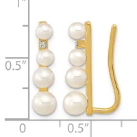 Gold earrings with four graduated white pearls stacked vertically on each earring, connected by gold spacers with a small diamond accent, shown next to a measurement scale.