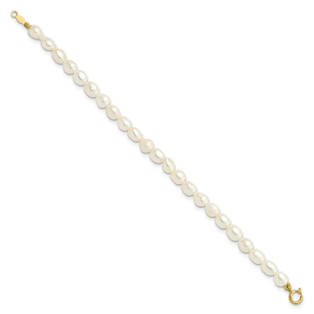 A gold-toned bracelet with round white pearl beads connected in a line, featuring small gold spacers between each pearl and gold loop clasps at both ends.
