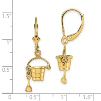 Gold-toned leverback earrings featuring small bucket charms with handle details and matching semicircular tops, displayed next to a measurement scale.