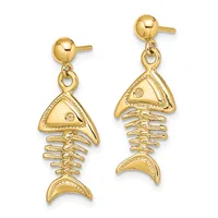 Pair of gold fish skeleton dangle earrings with ball studs, featuring triangular heads with small gemstones and segmented bone bodies with crescent-shaped tails.