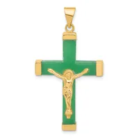 A gold crucifix pendant with a green jade cross and a polished gold corpus figure, with gold corner caps and a bale at the top.