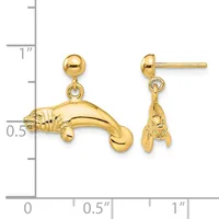 A pair of gold manatee charm earrings with ball posts shown next to a measurement scale indicating approximately one inch in length.