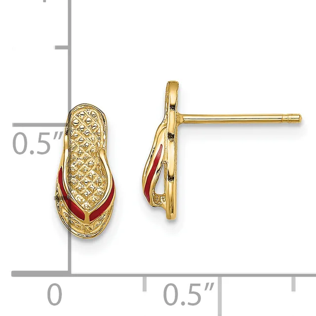 A pair of gold stud earrings with textured oval tops and red enamel curved accents, shown front and side view with a measurement scale indicating 0.5 inches in height.
