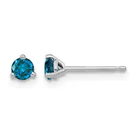 Pair of round blue topaz stud earrings set in sterling silver with three-prong settings, shown from front and side views.