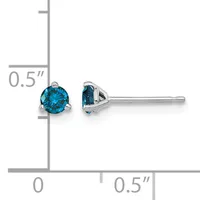 A pair of blue gemstone stud earrings in silver-toned metal shown next to a ruler indicating approximately 0.5 inches in length.