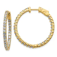 Pair of gold hoop earrings with cubic zirconia stones set along the inner and outer surfaces, shown from the front and side.