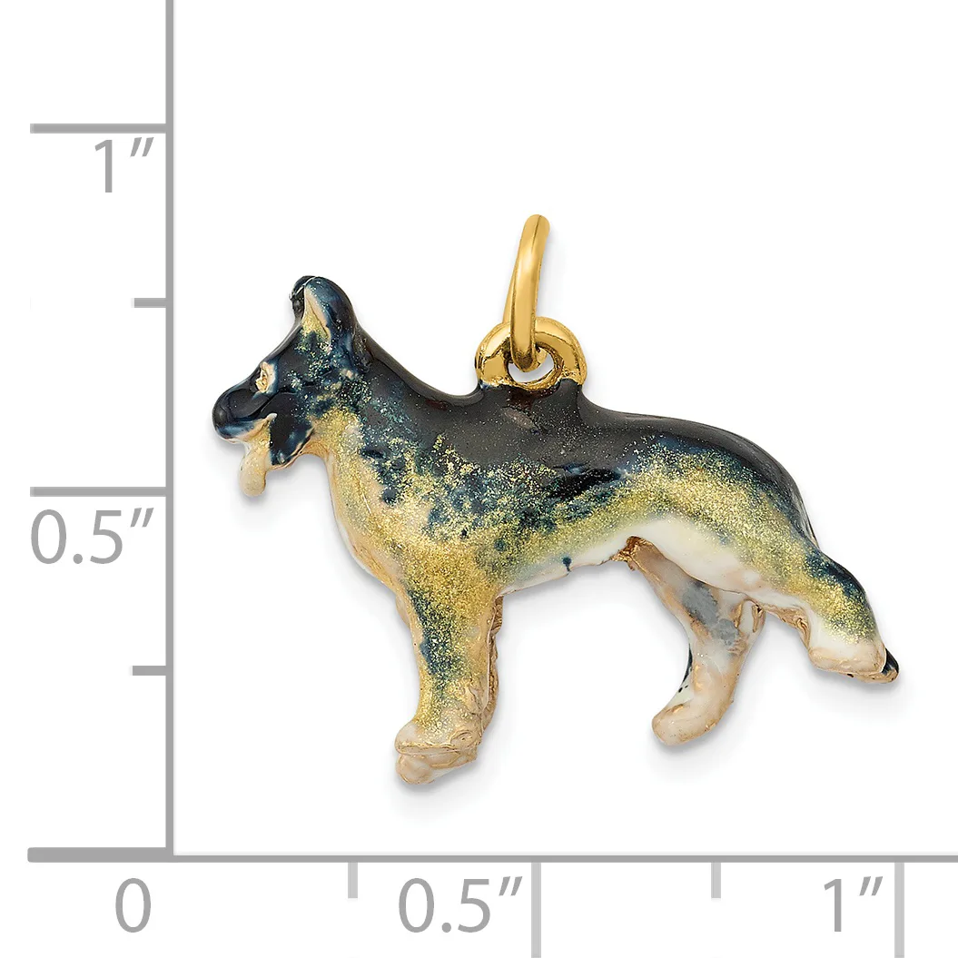 A gold-toned German Shepherd dog charm with black enamel markings and a small gold loop attachment, shown next to a ruler measuring approximately one inch in height.