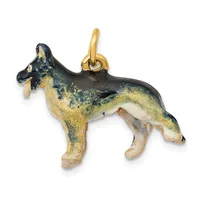 A decorative dog charm pendant with a gold-toned loop, featuring black enamel on the head and back with gold and cream coloring on the body and legs.