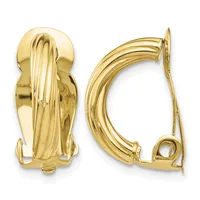 A pair of polished gold-toned curved clip-on earrings with ribbed textured detailing, shown from front and back views.