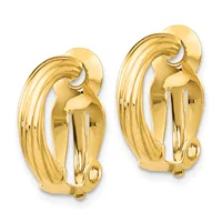 A pair of polished gold clip-on earrings with curved, ribbed designs and smooth rounded tops.