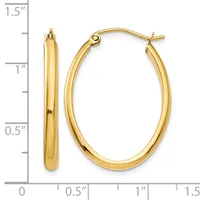 Pair of polished gold-toned oval hoop earrings with post and clutch closures, shown next to a measurement scale indicating approximately 1.25 inches in length.