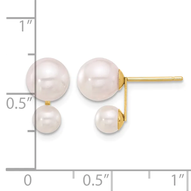Gold stud earrings with two pearl drops of different sizes on each post, displayed next to a ruler showing approximately one inch in height.