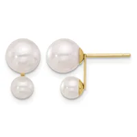 A pair of gold stud earrings featuring two white pearls of different sizes connected by a thin gold post, shown from front and side views.