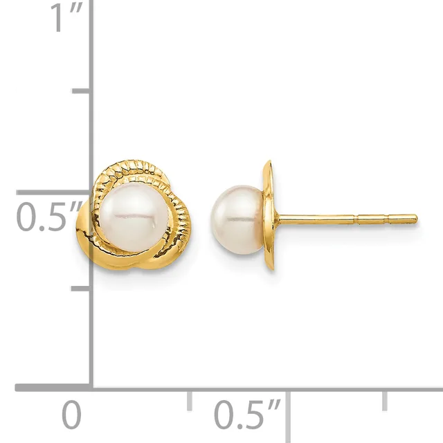 Two gold stud earrings with cream-colored pearl centers displayed next to a ruler showing approximately 0.5 inches in height.