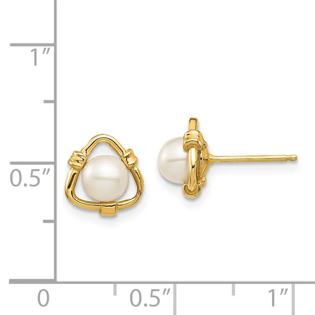 A pair of gold-toned triangular stud earrings with white pearl centers, displayed next to a ruler showing their size as approximately half an inch tall.