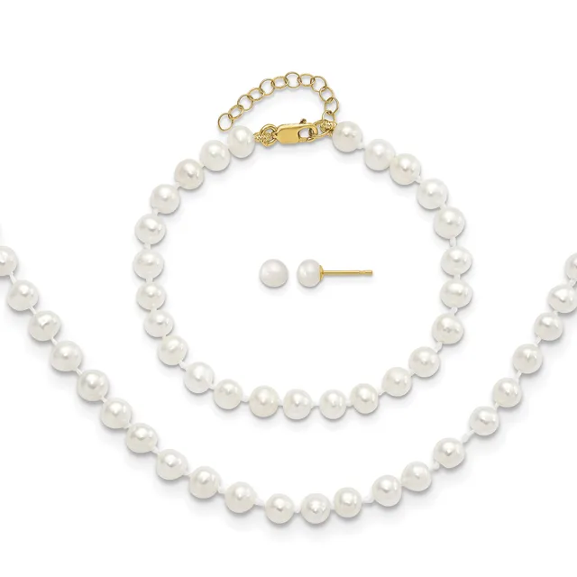 White pearl bracelet with gold clasp and chain extension displayed next to matching white pearl stud earrings on white background.