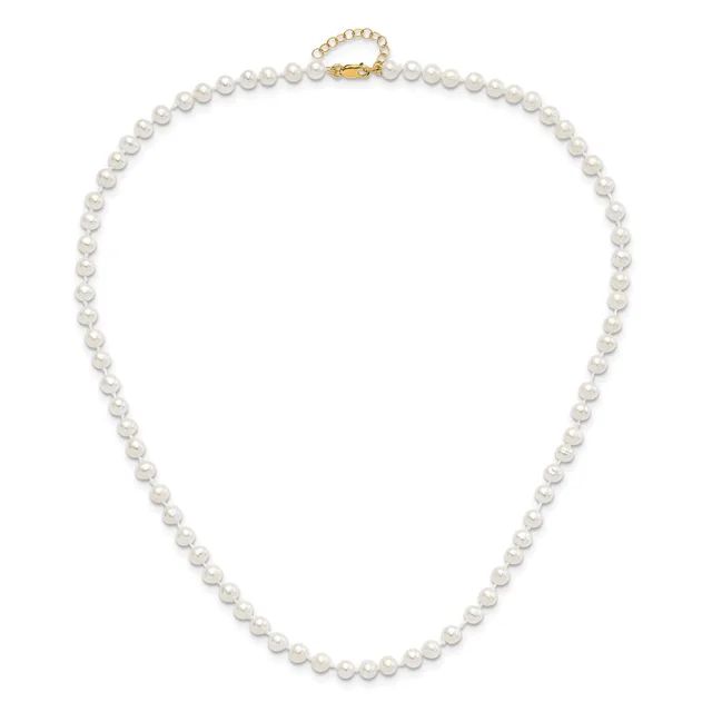 A string of white pearls with a gold-toned clasp and adjustable chain extension displayed on a white background.