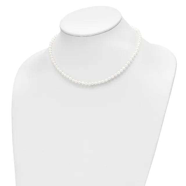 A white pearl necklace displayed on a white mannequin bust against a white background.