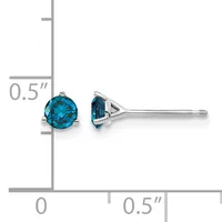 A pair of blue gemstone stud earrings in silver metal settings shown next to a measurement ruler indicating approximately 0.5 inches in diameter.