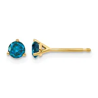 Pair of blue topaz stud earrings with round brilliant-cut stones set in yellow gold posts, shown from front and side views.