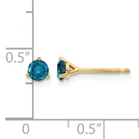 Pair of round blue topaz stud earrings in gold-tone metal settings displayed next to a ruler showing approximately 0.5 inches in diameter.