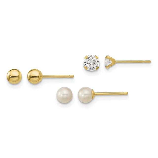 Three pairs of gold stud earrings displayed in a row: polished gold spheres, round white pearls, and round clear cubic zirconia stones in prong settings.