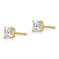 Pair of gold stud earrings with square-cut clear crystals set in four-prong gold settings on post backs.