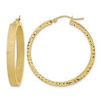 Pair of gold hoop earrings, one with a textured satin finish and one with a diamond-cut pattern, shown front and side view.