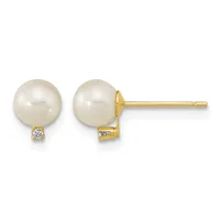 Pair of gold stud earrings featuring round cream pearls with small diamond accents below each pearl.