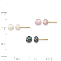 Three pairs of pearl stud earrings displayed on a ruler: white pearls at one inch, pink pearls at 1.25 inches, and dark gray pearls at 0.5 inches, each with gold posts.