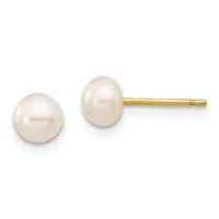 A pair of white pearl stud earrings with gold posts and backs, shown from the front and side view against a white background.