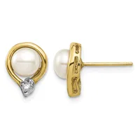 Pair of gold stud earrings with white pearl tops and small diamond accents at the base, shown from front and side views.