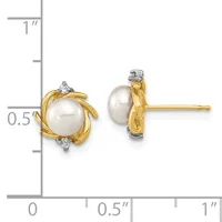 Two-tone stud earrings featuring white pearls wrapped in twisted gold bands with small diamond accents, shown next to a measurement scale.