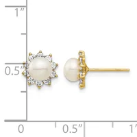 A pair of stud earrings featuring round white pearls surrounded by diamond halos in gold settings, displayed against a measurement scale.
