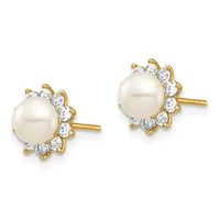 Pair of gold stud earrings featuring round white pearls surrounded by clusters of clear round crystals, shown from the front.