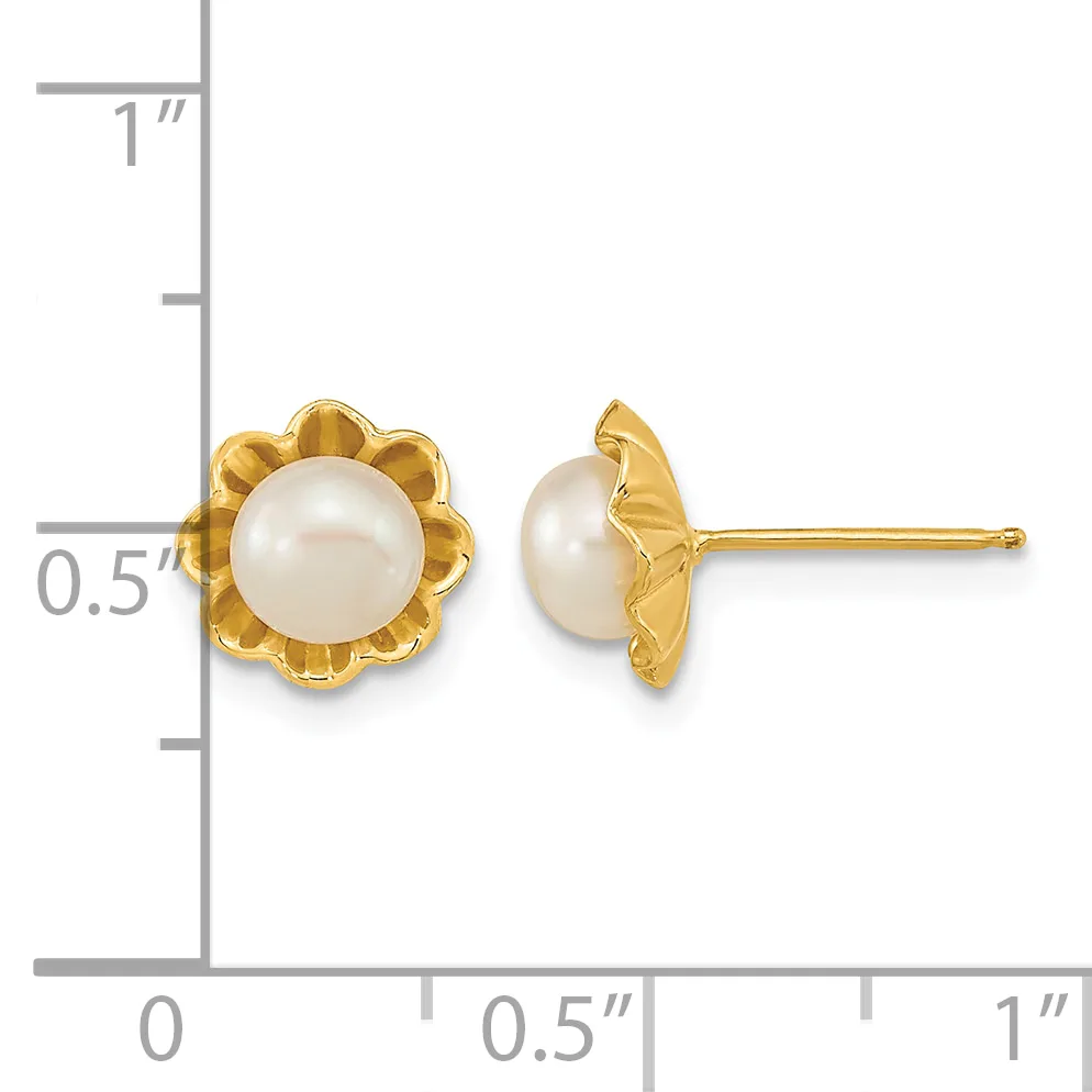 Pair of gold-tone stud earrings with white pearl centers surrounded by scalloped flower-shaped settings, shown front and side view against a measurement scale.