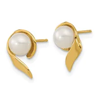 Pair of gold stud earrings with white pearl caps and curved gold sweep designs extending downward, shown from the front.
