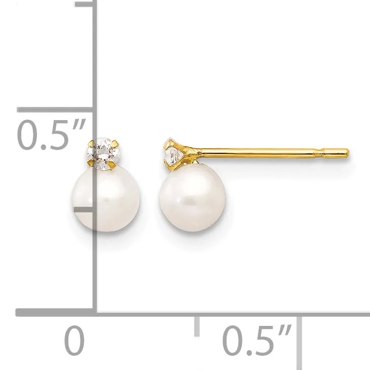 Pair of gold stud earrings featuring white pearl drops topped with small diamond accents, shown next to a measurement scale indicating approximately 0.5 inches in length.