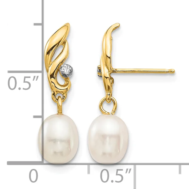 A pair of gold earrings with diamond accents and dangling white pearl drops, shown from front and side views with a measurement scale.